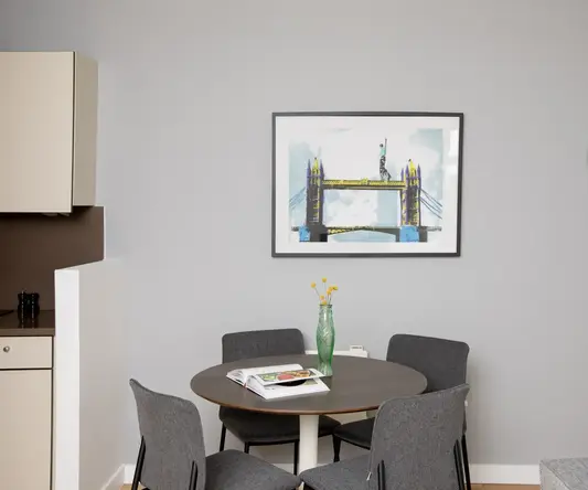 a table and chairs in a room