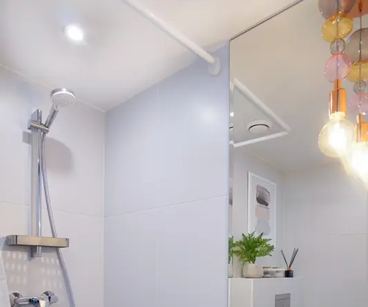 a bathroom with a sink and a shower