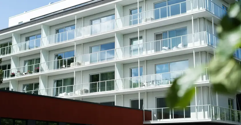 a building with balconies and windows