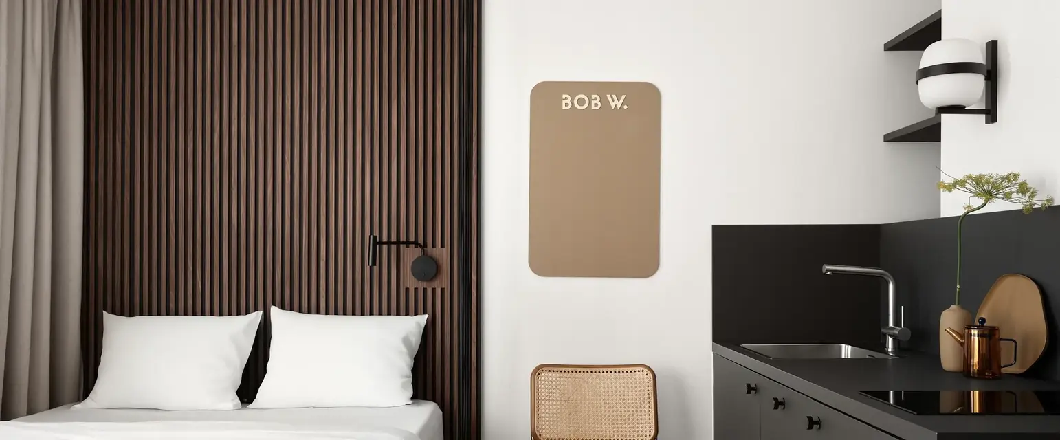 a room with a bed and a chair