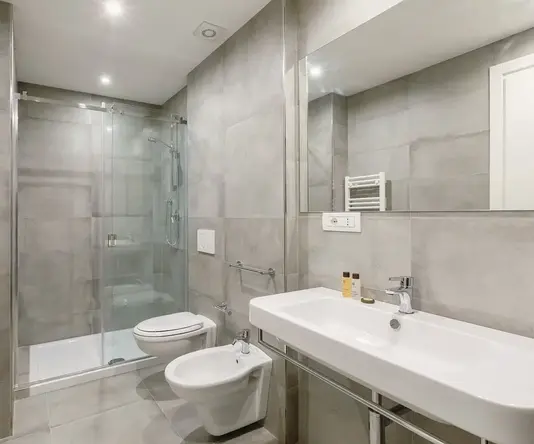 a bathroom with a sink and toilet