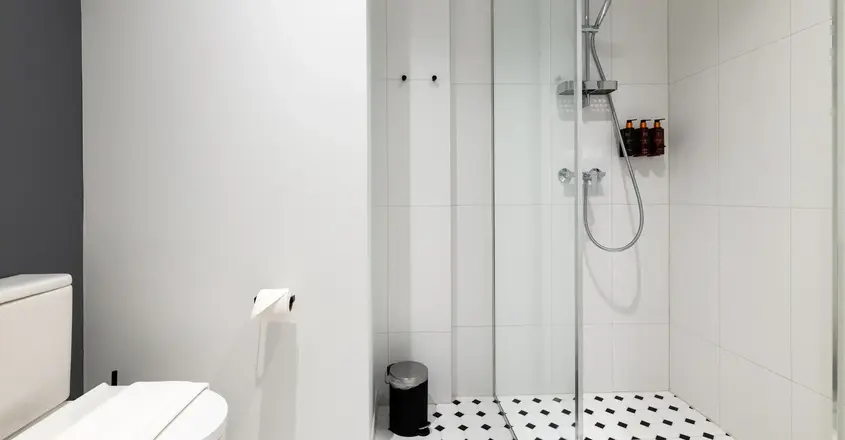 a bathroom with a glass shower