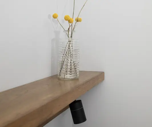 a vase with yellow flowers in it