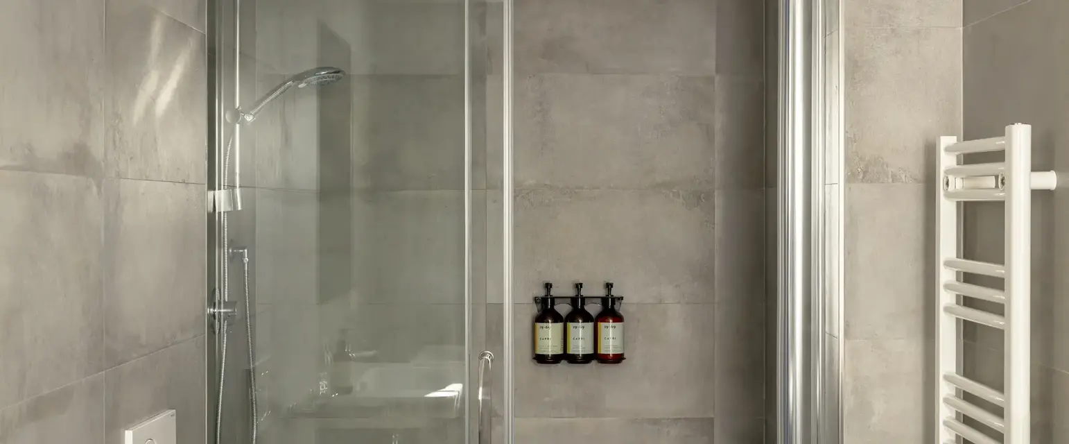 a shower with glass doors