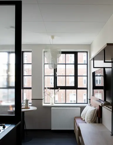 a room with a tv and a table