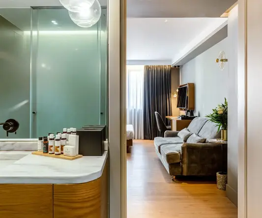 a room with a couch and a bathtub