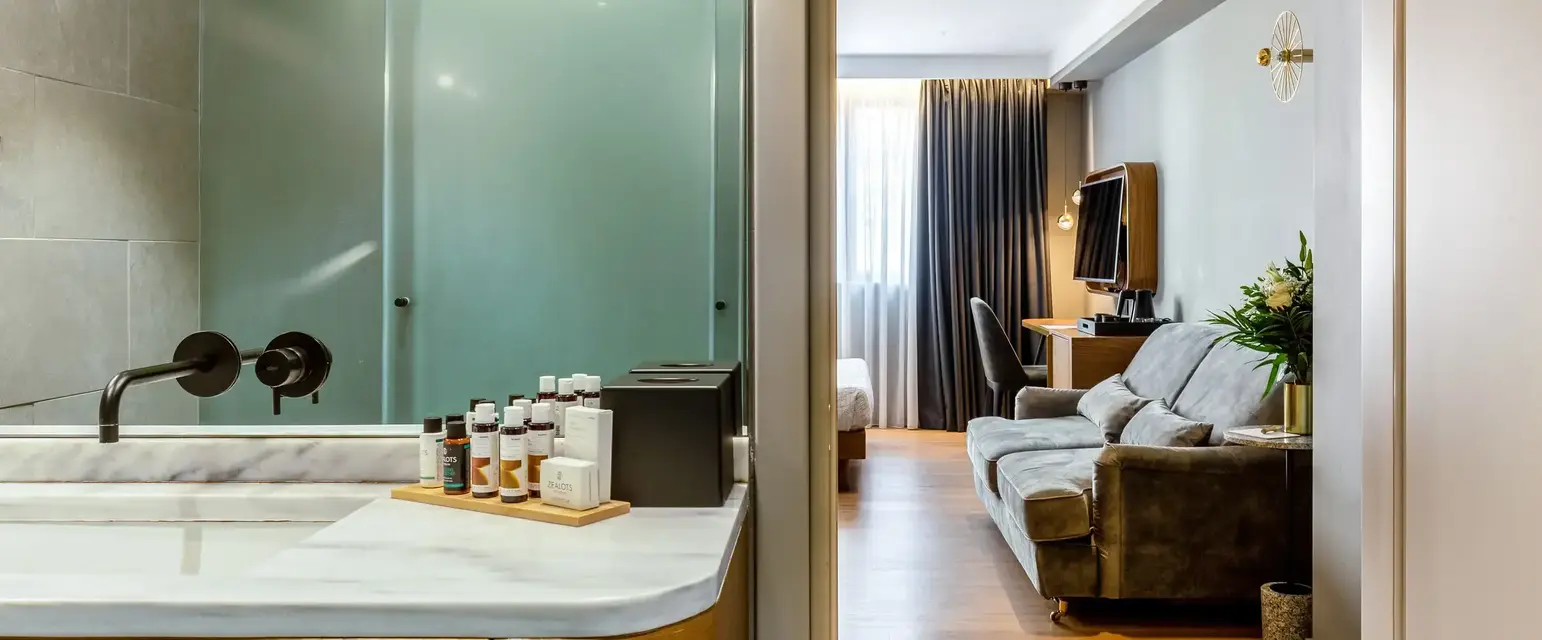 a room with a couch and a bathtub