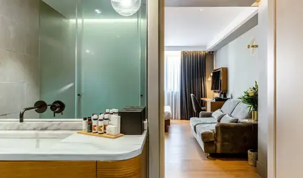 a room with a couch and a bathtub