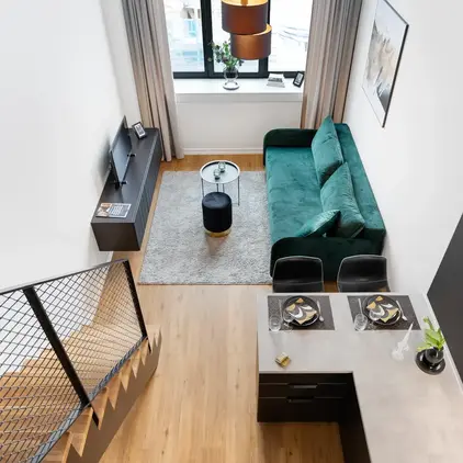 a living room with a couch and a table