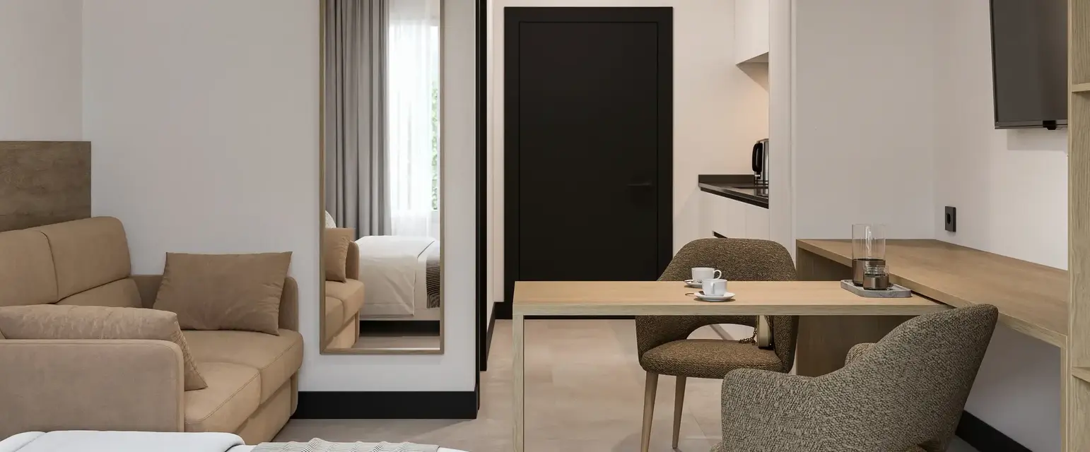 a room with a table and chairs