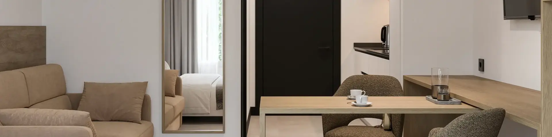 a room with a table and chairs