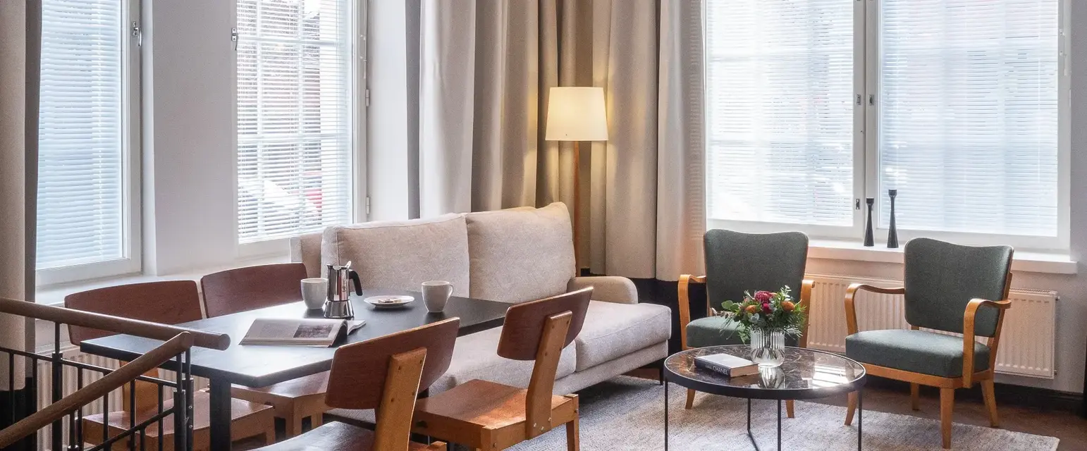 a room with a couch and table