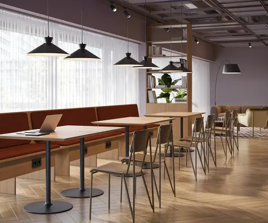 a room with tables and chairs