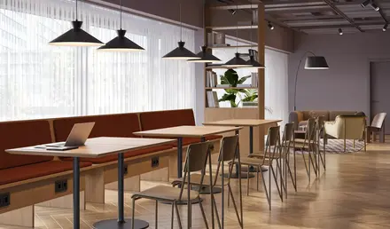 a room with tables and chairs