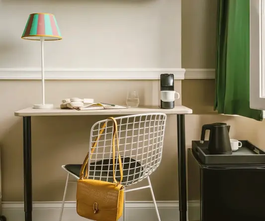 a chair and a lamp in a room