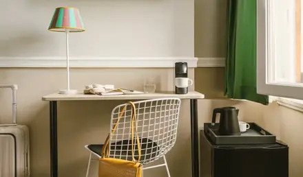 a chair and a lamp in a room