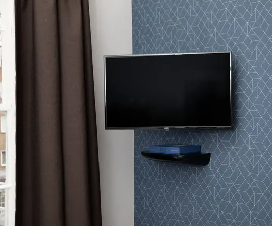 a tv mounted on a wall