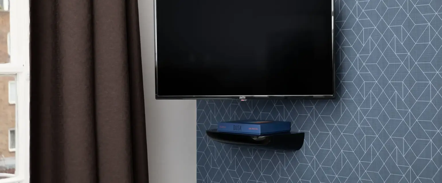 a tv mounted on a wall
