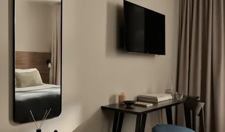 a mirror above a table