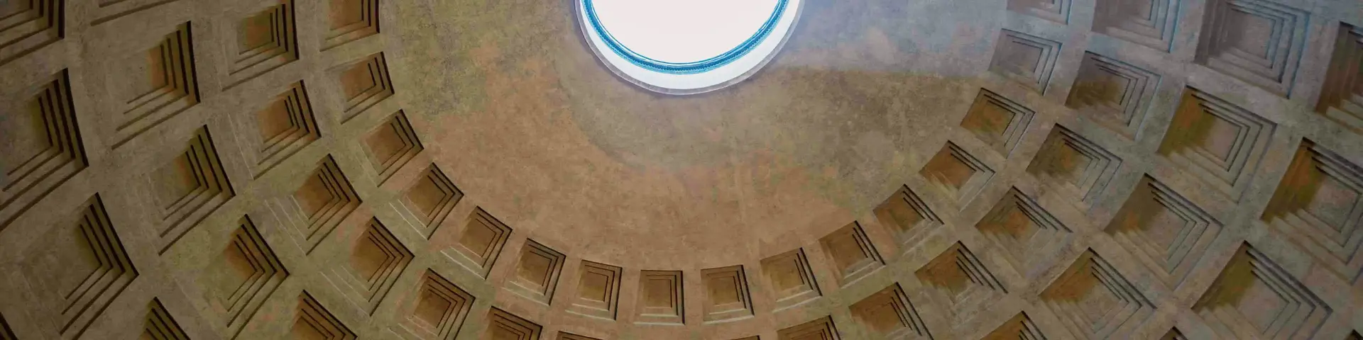 a ceiling with a light in the middle