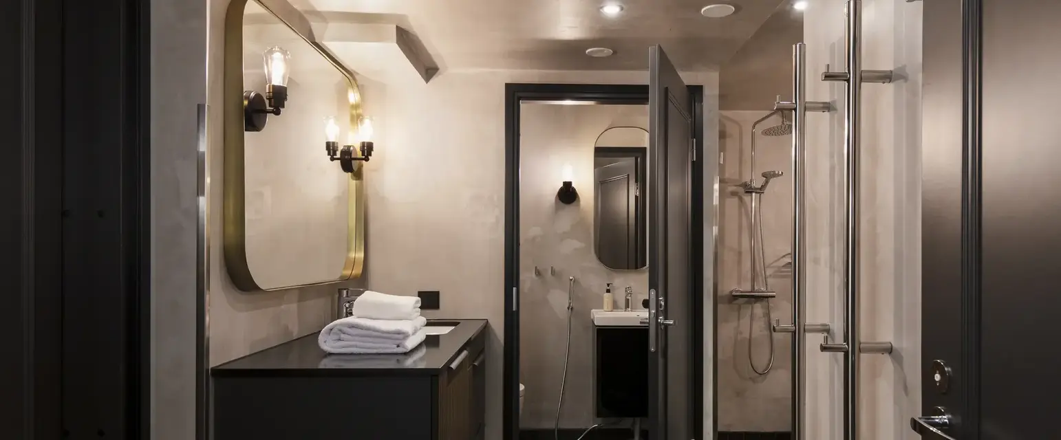 a bathroom with a mirror and sink