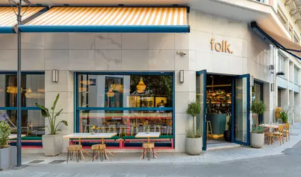 a building with tables and chairs