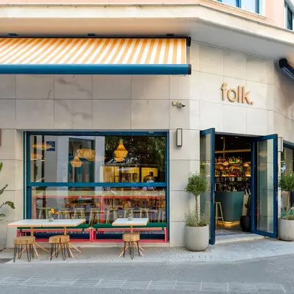 a building with tables and chairs