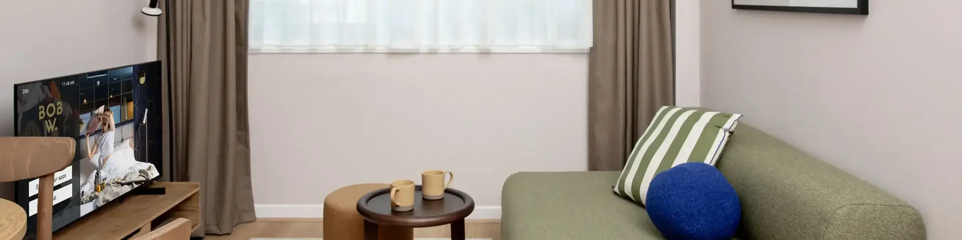a living room with a couch and a book