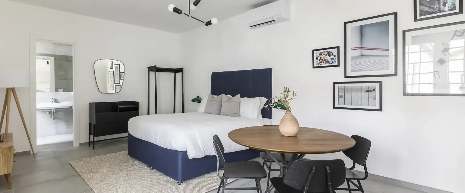 a room with a bed and a table