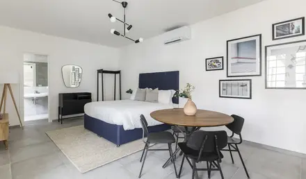 a room with a bed and a table