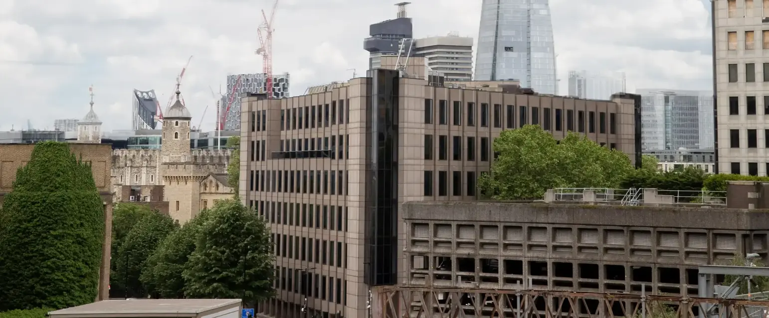 a city with a tall triangular building