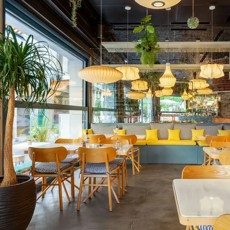 a room with tables and chairs