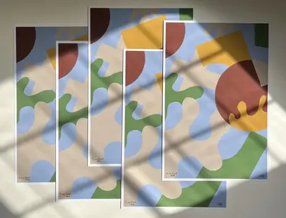 a group of art pieces on a wall