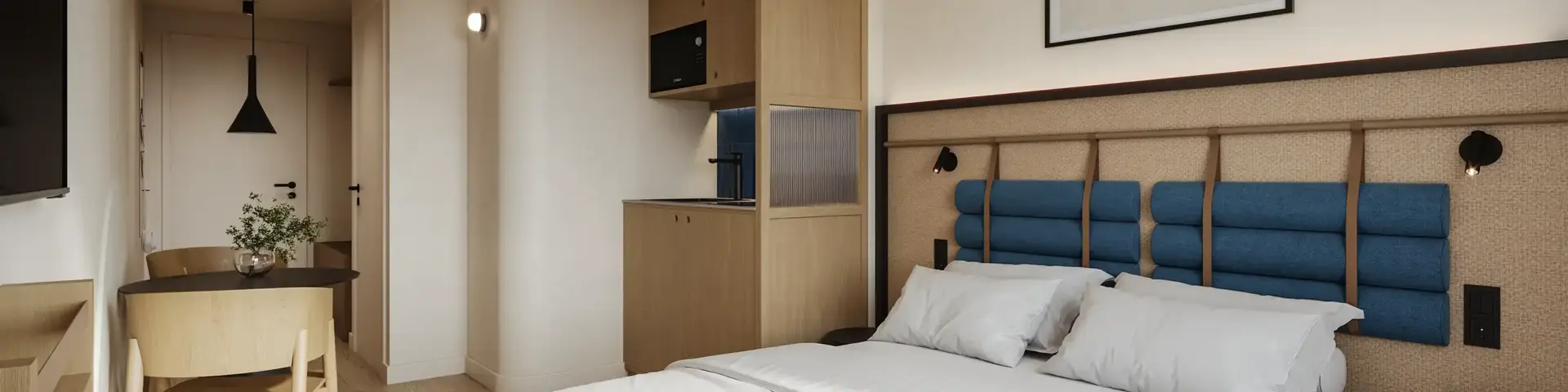 a bedroom with a bed and a rug