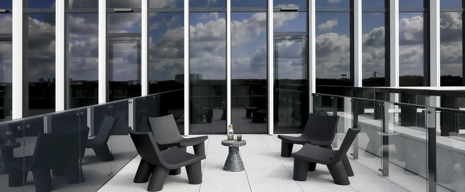 a room with chairs and a table