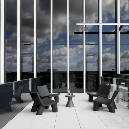 a room with chairs and a table