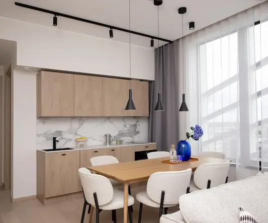 a dining room with a table and chairs