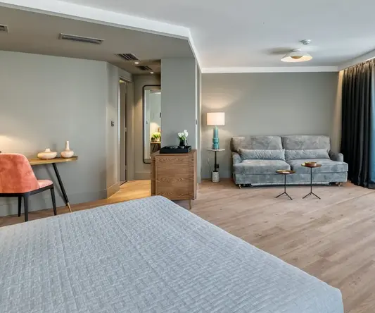 a room with a bed and a couch