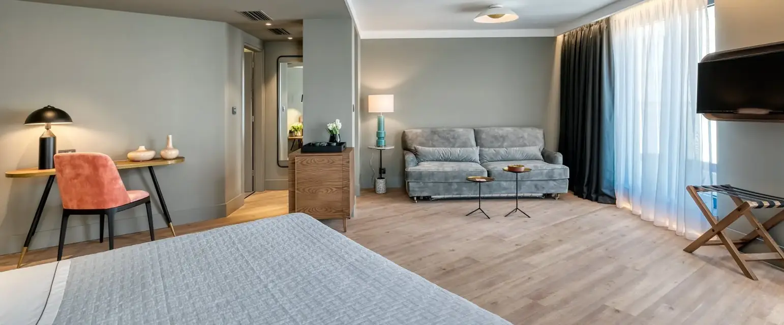 a room with a bed and a couch