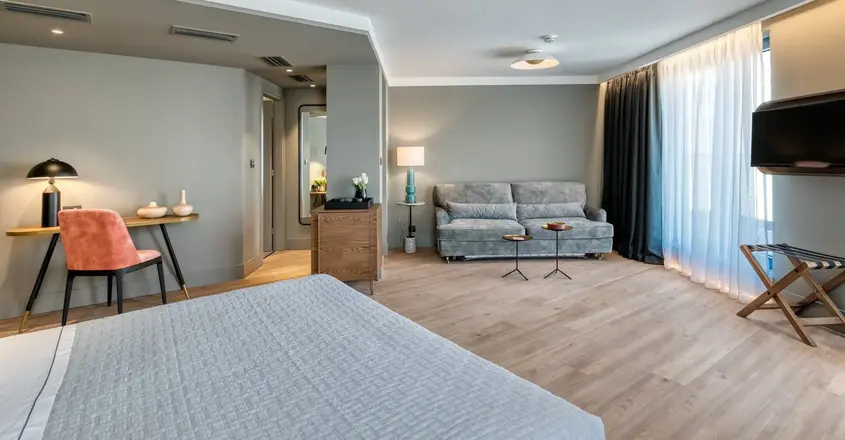 a room with a bed and a couch