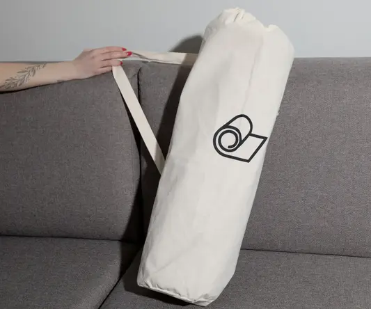 a hand holding a bag