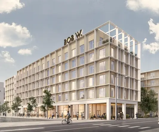 a building with people walking on the street