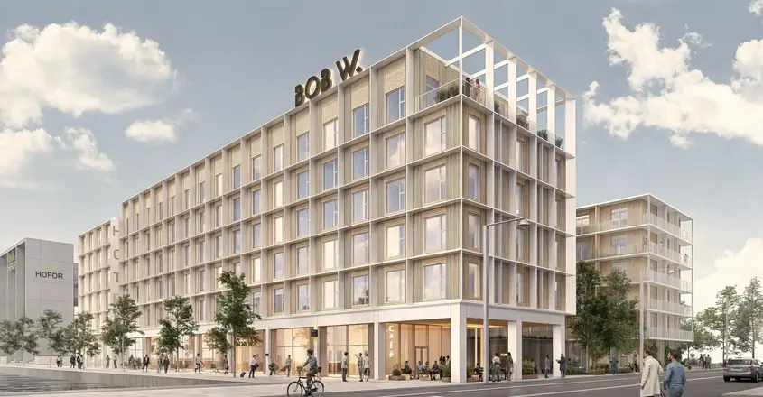 a building with people walking on the street