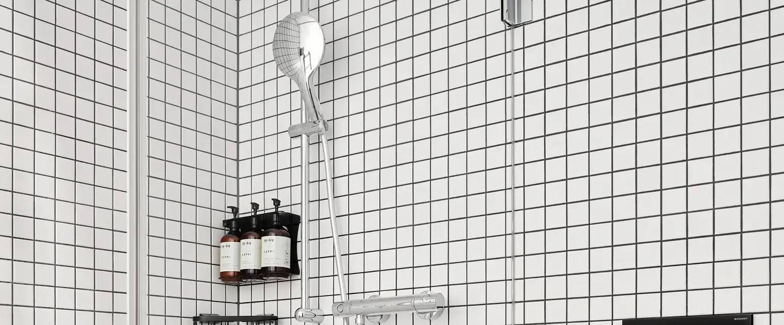 a bathroom with a shower and toilet