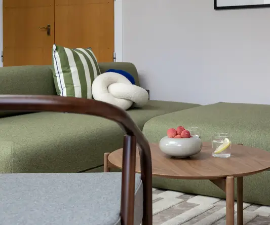 a living room with a couch and a sofa