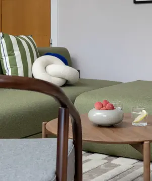 a living room with a couch and a sofa