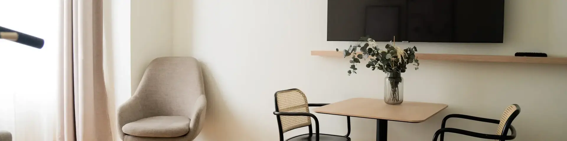 a room with a table and chairs