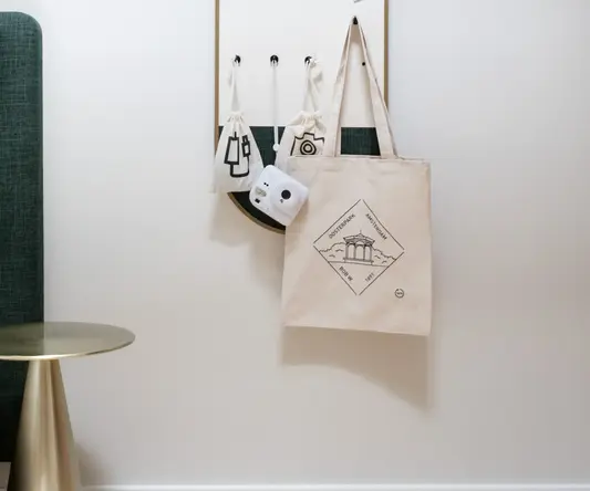 a white board with a white board and a white bag on it