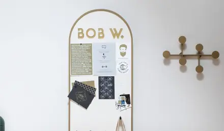 a white board with a white board and a white bag on it