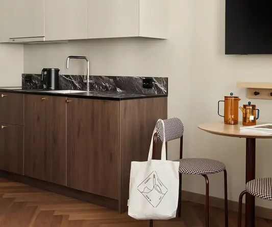 a kitchen with a table and a countertop
